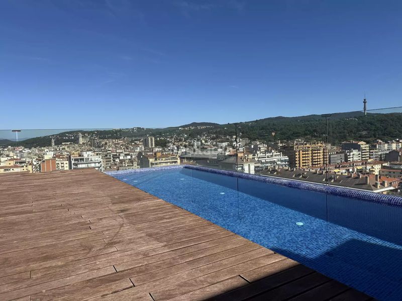 Foto 2a6d7c06-b685-4eb8-bf1a-3b7a443f831e. Pis amb calefacció aparcament piscina a Eixample Sud-Migdia Girona