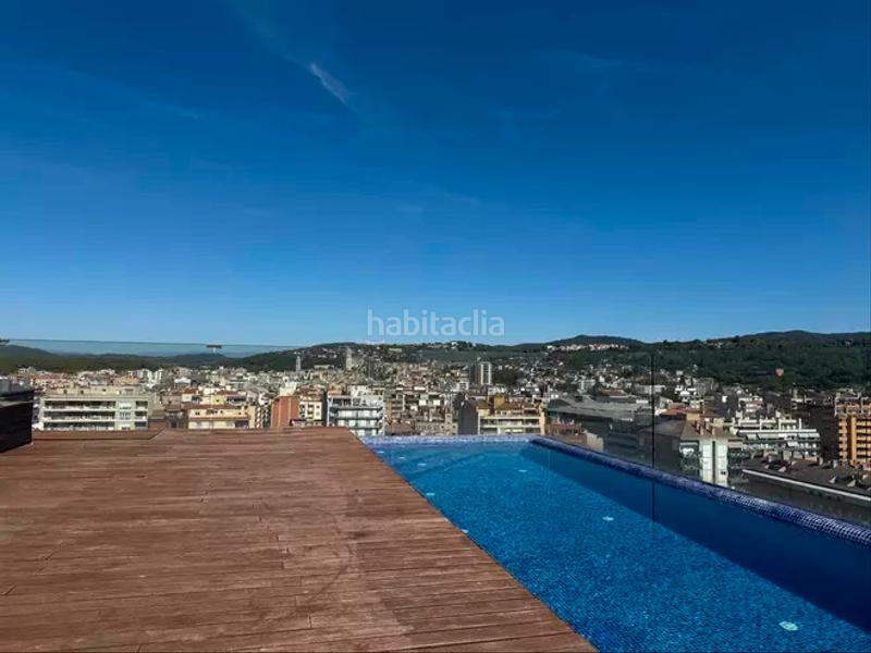 Foto c4a15bab-c069-43e2-89ff-b4c127fcd8c2. Pis amb calefacció aparcament piscina a Eixample Sud-Migdia Girona