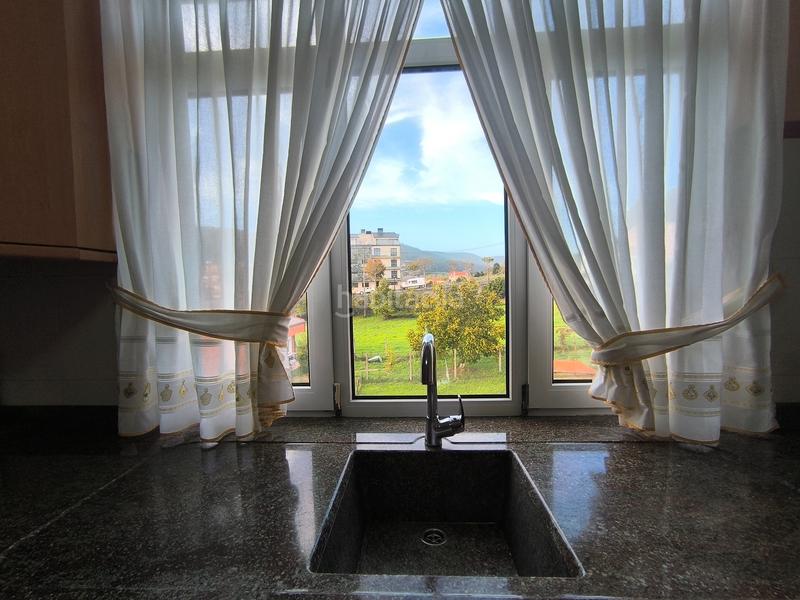 Foto f3609582-9e19-456d-9873-74d2d42e7e52. Casa adossada amb calefacció a Cedeira