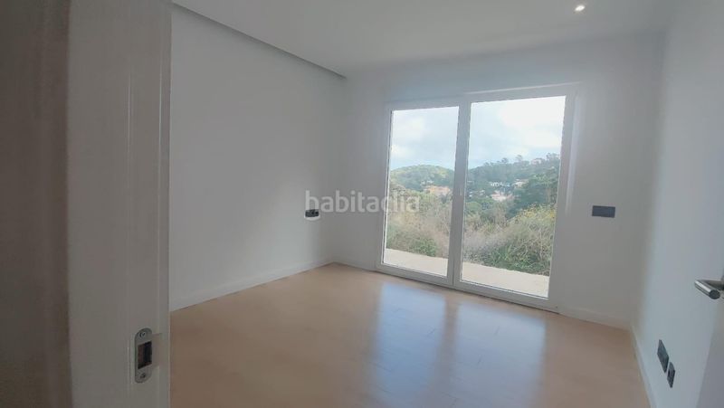 Foto 5b44dcca-f681-43e4-8e90-83b363d9e069. Casa  unifamiliar de obra nueva con jardín y vistas al mar en Lloret de Mar