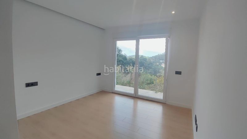 Foto ffdadce3-56cc-4355-9e33-58a5fe39eba5. Casa  unifamiliar de obra nueva con jardín y vistas al mar en Lloret de Mar