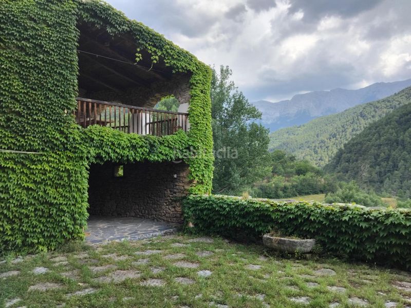 Foto 82215ffd-d848-432b-bc9c-cda6d0b40947. Masia amb calefacció aparcament a Arsèguel