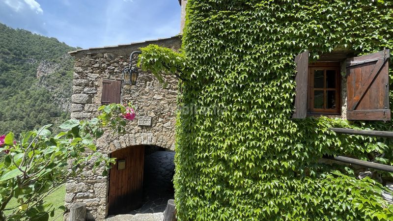 Foto 95d064e8-079d-478e-9168-fef4bea10ac3. Masia amb calefacció aparcament a Arsèguel