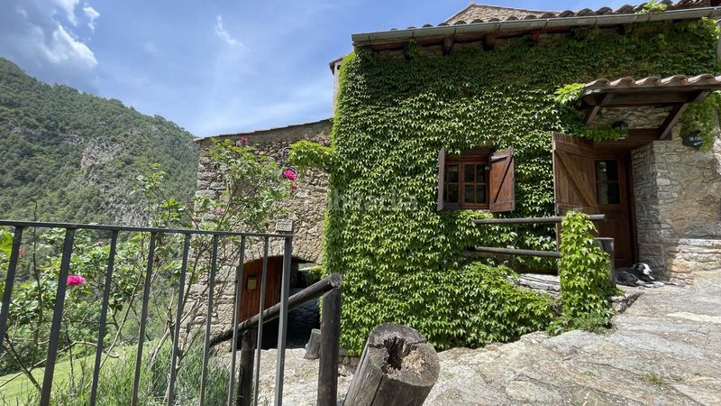 Foto b093d81f-a097-46ea-8da9-4ad2bf4f457b. Masia amb calefacció aparcament a Arsèguel