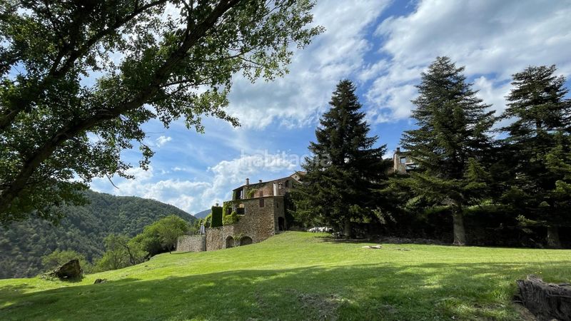 Foto b31ad01e-a396-4959-899e-f6aa206f2dd9. Masia amb calefacció aparcament a Arsèguel