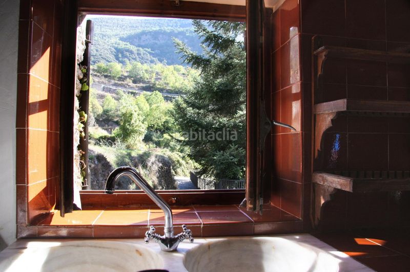 Foto d1ac79fe-94bd-4897-9f25-f538c35b045a. Masia amb calefacció aparcament a Arsèguel