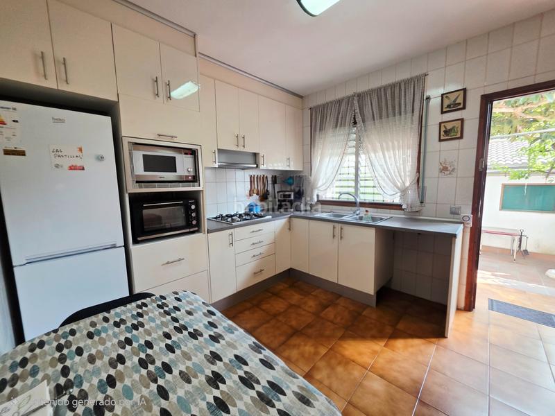 Foto 797c53c2-5375-45f5-9989-6cefcb64e199. Casa adossada amb xemeneia aparcament a Coma-ruga platja Coma-ruga