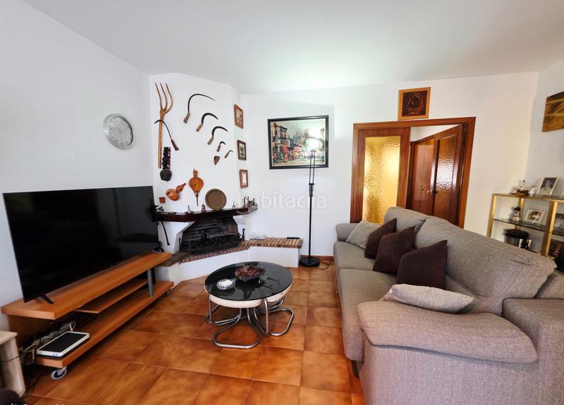 Foto a6422a40-4a67-4a43-aa26-52fe7f3a2dcd. Casa adossada amb xemeneia aparcament a Coma-ruga platja Coma-ruga