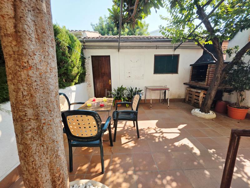 Foto d6fc25ef-241e-481b-98ab-f4d0fa818acc. Casa adossada amb xemeneia aparcament a Coma-ruga platja Coma-ruga