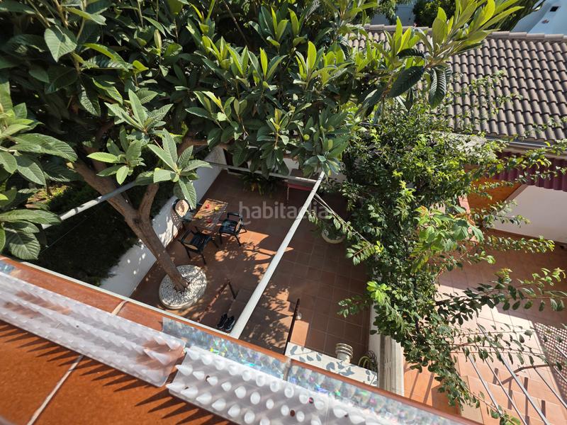 Foto fd015a9f-10e1-4a4e-96e5-bfe5cc77053a. Casa adossada amb xemeneia aparcament a Coma-ruga platja Coma-ruga