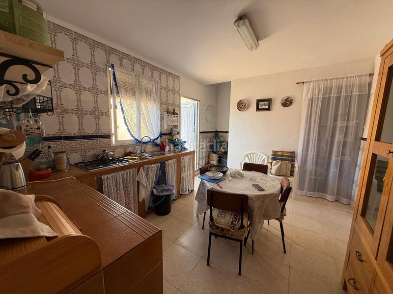 Foto eb0b9bf7-cf88-443e-8a56-5c3b25a65e49. Casa a schiera con camino parcheggio in Caracuel de Calatrava