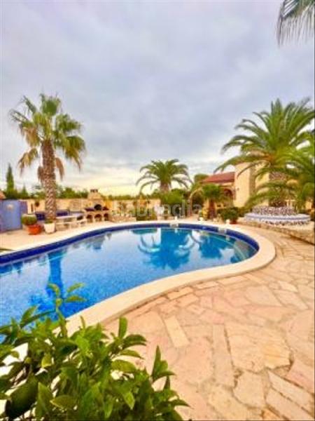 Foto bd38eff6-44df-4953-96c7-fa85d164a2c8. Casa amb aparcament piscina a Centre Miami Platja