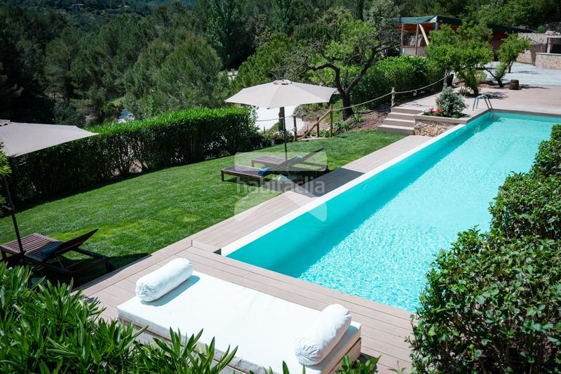 Foto 5cef63b6-e340-4dea-8136-0e9154f4d74b. Xalet amb calefacció aparcament piscina a Colldejou