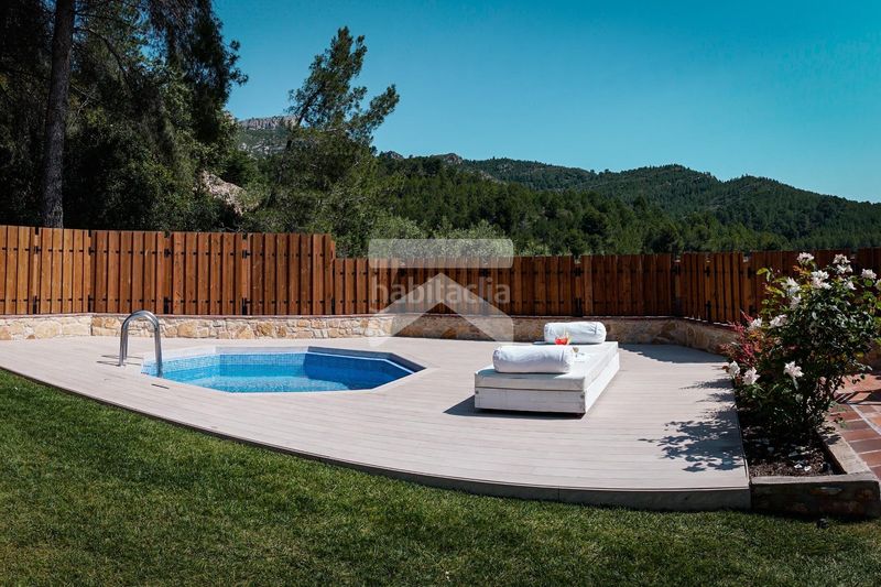 Foto a53db14b-ba56-44d3-86b3-fc8bd3c9e3eb. Xalet amb calefacció aparcament piscina a Colldejou
