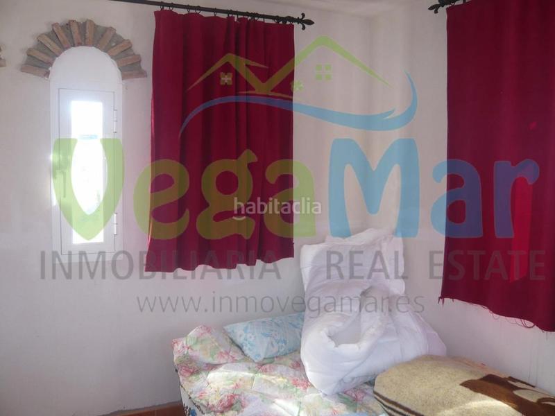 Foto 3b8cc8f6-bcf5-4007-ad55-0e2041156917. Masía referencia f409
se vende cortijo en cazulas (otivar). esta parcela de 50.000m2 contiene jardines, frutales y olivos. en ella está en Otívar