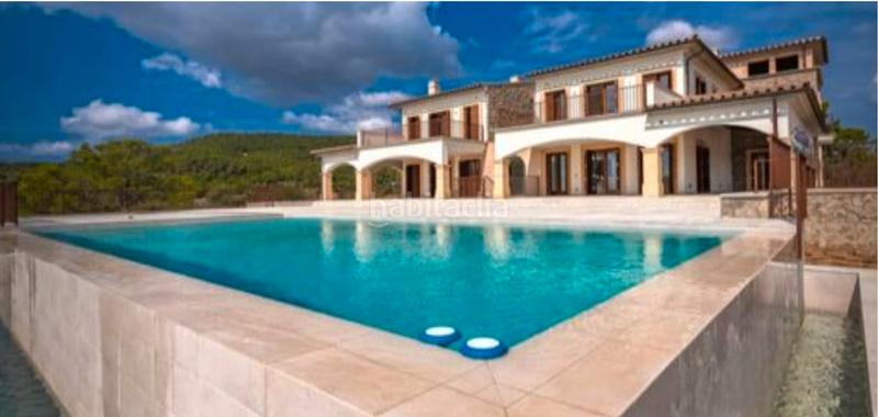 Foto 7b2d05d8-fee5-43bc-9d4e-4373f6747bec. Mas avec cheminée parking piscine dans Es Camp de Mar Andratx