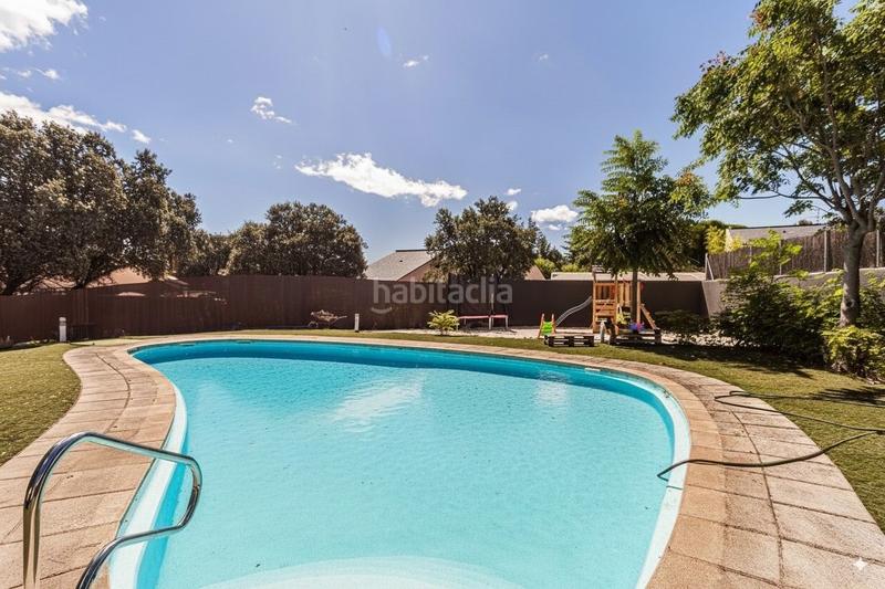 Foto febeb5d3-bdf5-42da-9aae-128c36fe2479. Maison jumelée avec chauffage parking piscine dans El Guijo-Colonia España Galapagar