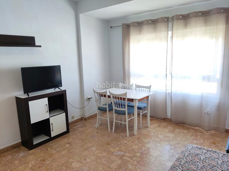 Foto 9bdd3b0b-39ee-45b5-ae1d-28dda47260ea. Piso con 4 habitaciones, dos balcones, salón con aire acondicionado en Gandia