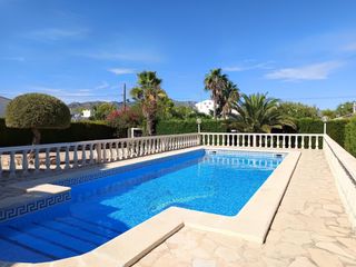 Chalet  Carrer flor de la-3 cales. Villa tipo ibicenco con piscina y vistas al mar y a la montaña e