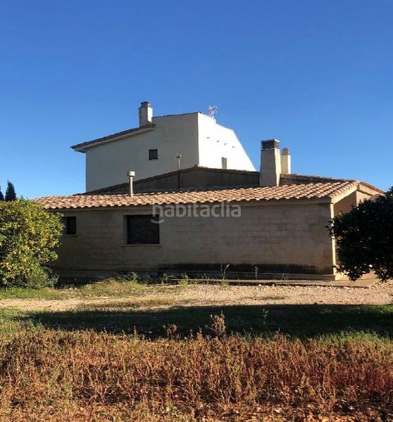 Foto 5d9090a8-809d-40e1-abe8-cb3ac50102d1. Masia amb aparcament a Camarles