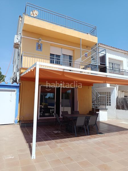 Foto 7cf948c0-f420-4ee0-8ca2-19c3d4813813. Casa  con piscina y jardín cerca de las playas, ideal para inversión con licencia turística en Ametlla de Mar (L´)