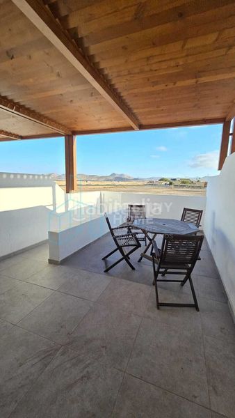 Foto 86382898-a3e2-4100-9922-1174a290e7dd. Dúplex amb piscina a Corralejo Oliva (La)
