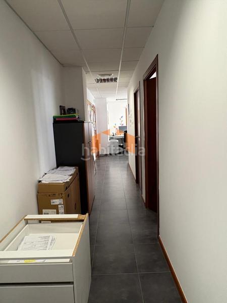 Foto c804beb7-ff76-4f5c-8742-2c36f4f955ff. Office space with heating parking in Navia Vigo