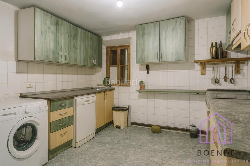 Foto 855e8d07-482e-4d68-a3ba-d67723e7d0ea. Casa a schiera con camino in Chinchón