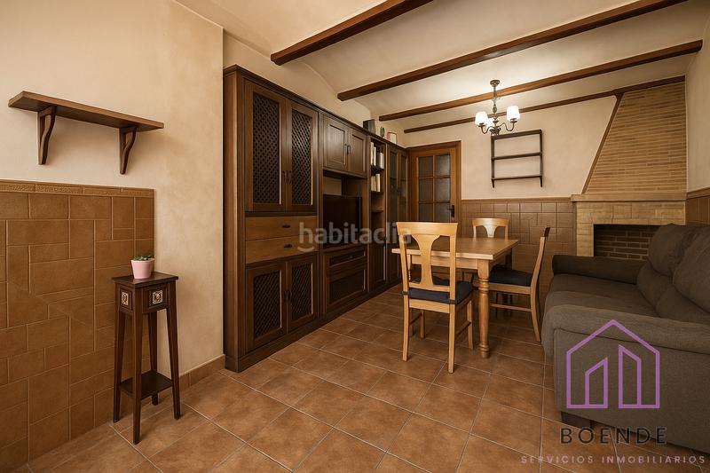 Foto 9bf847d2-c8ef-420c-840a-876acdc4a830. Casa a schiera con camino in Chinchón