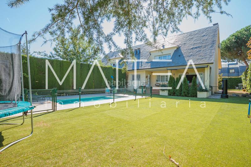 Foto 68e3d1a3-f88b-4a9a-9ad3-de459e972127. Casa bifamiliare con camino riscaldamento parcheggio piscina in Galapagar