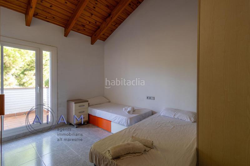 Foto d1bbd9a1-5949-45ea-b081-8bac1952d6ae. Reihenhaus mit parking in Santa Susanna