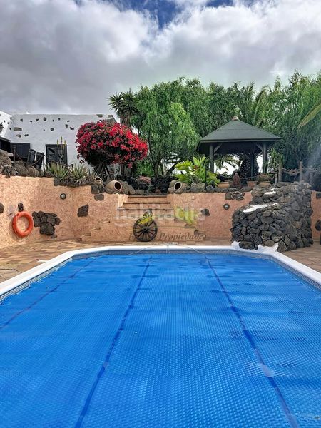 Foto 67ebaae9-1dd5-4387-b2c0-d97491bcd910. Masia amb piscina a Tiagua Teguise