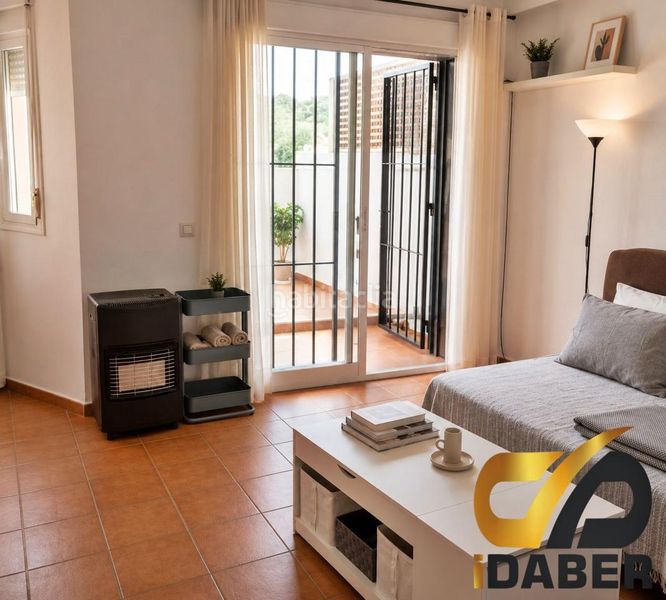 Foto 5b716ec1-e73c-40b3-9b74-c3624b83e2ac. Casa adossada a Magán