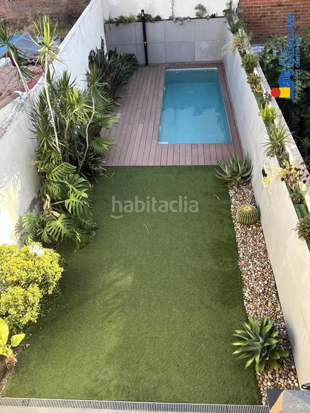 Foto 51bcc432-37c6-4158-82e5-9ce79202541b. Casa adossada amb calefacció aparcament piscina a Badalona