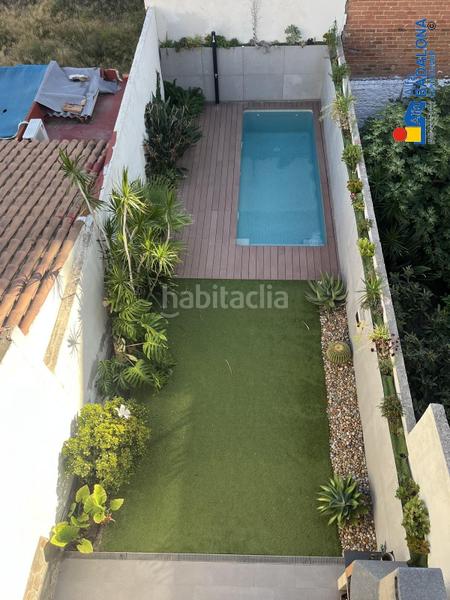 Foto 6bb12be9-36d1-43ab-b6ca-69a5d5c85c57. Casa adossada amb calefacció aparcament piscina a Badalona