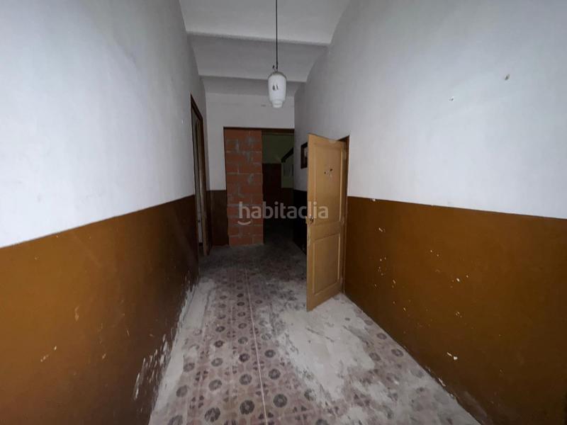 Foto 06230fd3-8f6b-4856-a8f7-45fc0e8c3b61. Casa adosada casa en venta en Centre Figueres