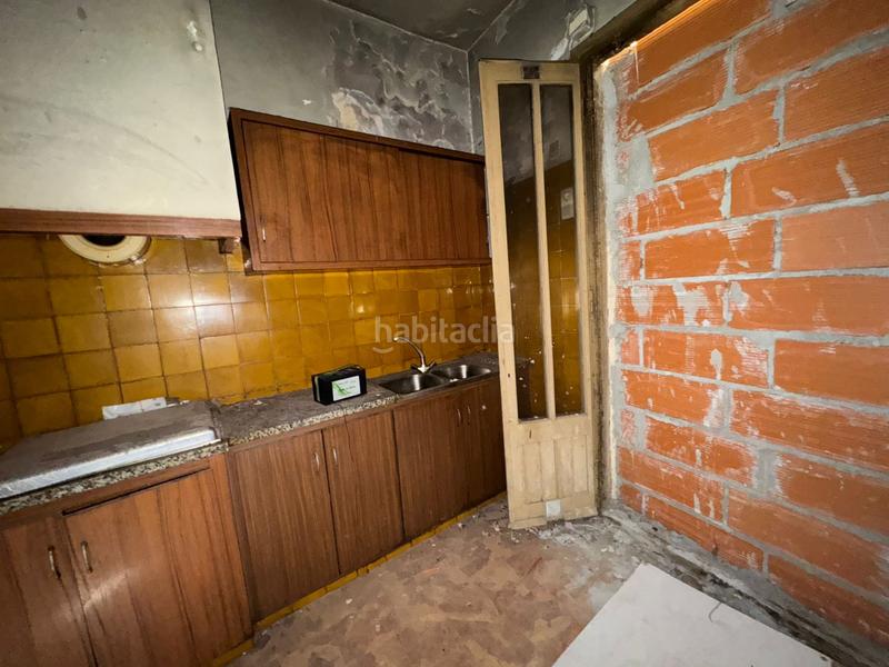 Foto c224241f-ea1c-4ced-8650-756123edffb6. Casa adosada casa en venta en Centre Figueres