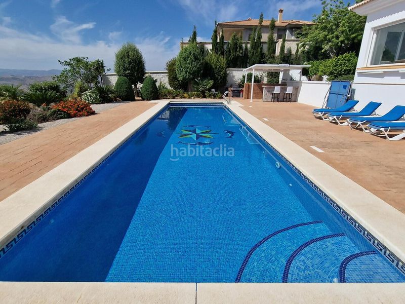 Foto 51c7c4b8-0700-4c58-8e4c-6a82fb5b2620. Casa amb piscina a Periana