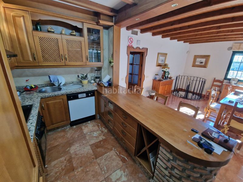Foto ad53fcb1-b2a2-40c8-a50c-d5754c190899. Haus mit parking pool in Viñuela