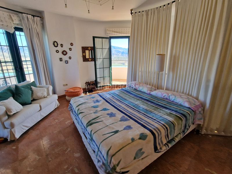 Foto b2a01b34-1f9a-45f4-a7c3-476cbb745ee3. Haus mit parking pool in Viñuela