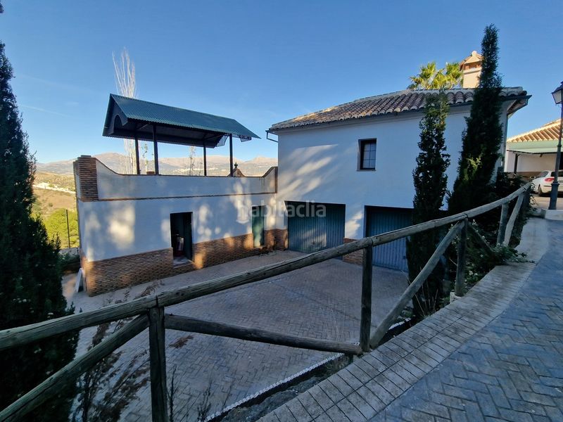 Foto f1359b75-604f-4267-a76d-06bed5b24c26. Haus mit parking pool in Viñuela