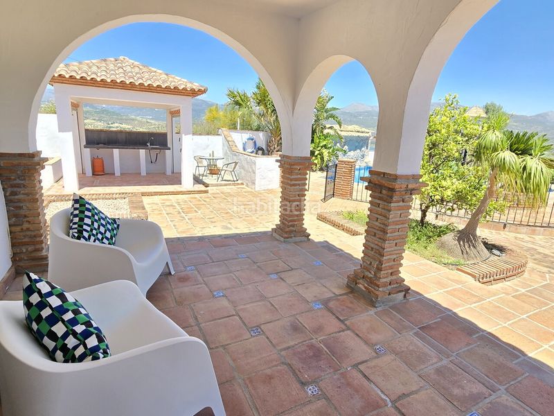 Foto 89aceddf-4384-44fc-b3ee-f322d7a2a586. Casa amb aparcament piscina a Viñuela