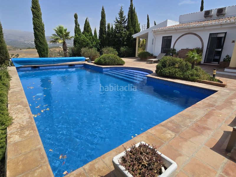 Foto 1e57d793-d1e6-4138-96a9-c57c9a9b798e. Casa amb aparcament piscina a Viñuela