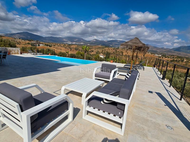 Foto 47f745f5-a8b7-4ce0-b04b-0e3e85183616. Casa en Viñuela