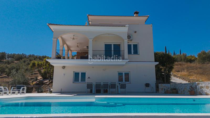 Foto 55837244-cc7b-421a-a0dc-a18e6b8fe6ee. Casa en Viñuela