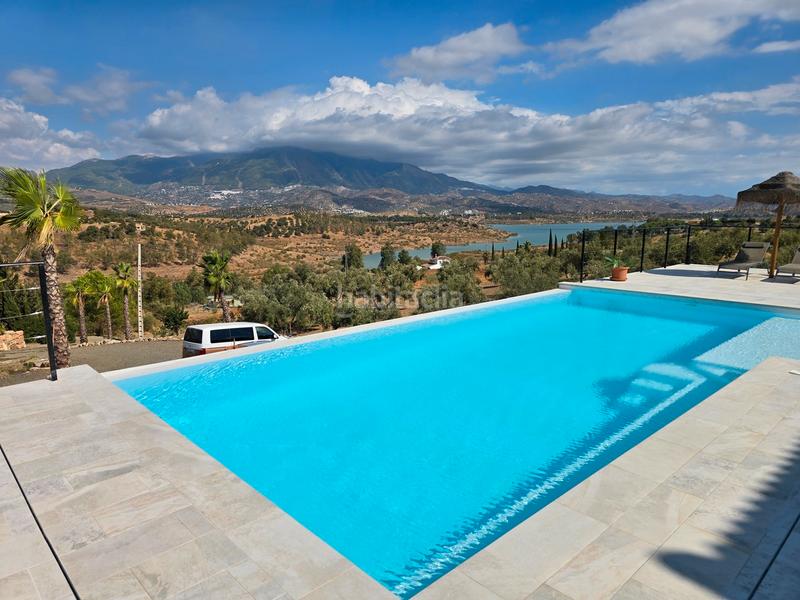 Foto c6e0044e-ad38-48d9-9d78-56b8c4bf65a8. Casa en Viñuela