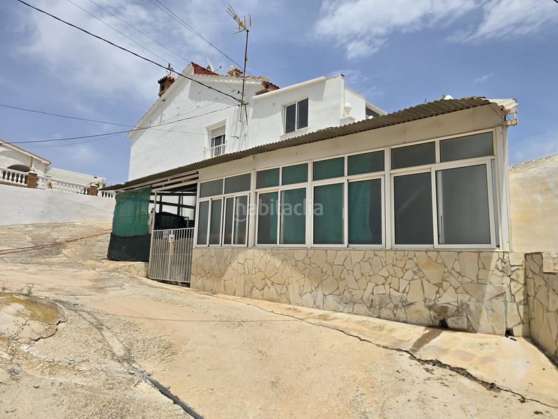 Foto a6381d07-c7d3-49f2-9a91-a36297b3744e. Casa amb aparcament piscina a Viñuela