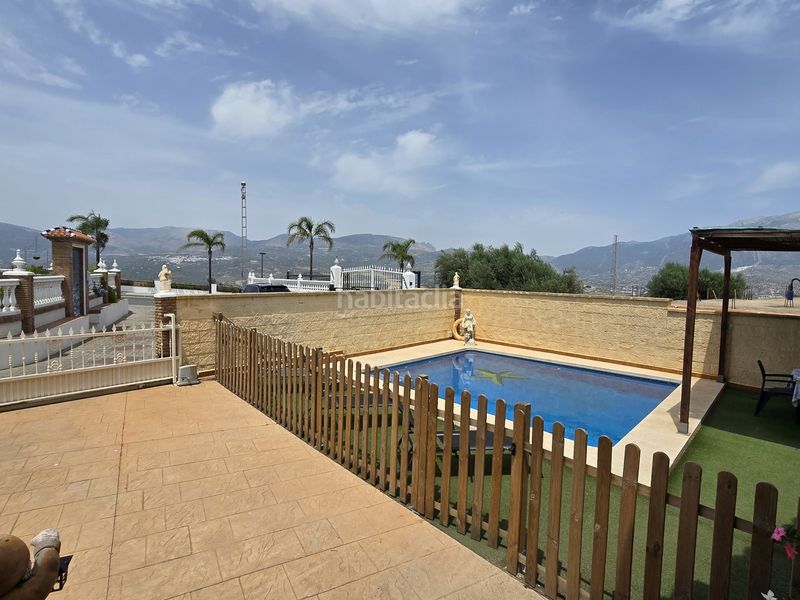 Foto c9ef5d8a-bbcb-49bf-8991-ef057ba66e84. Casa amb aparcament piscina a Viñuela