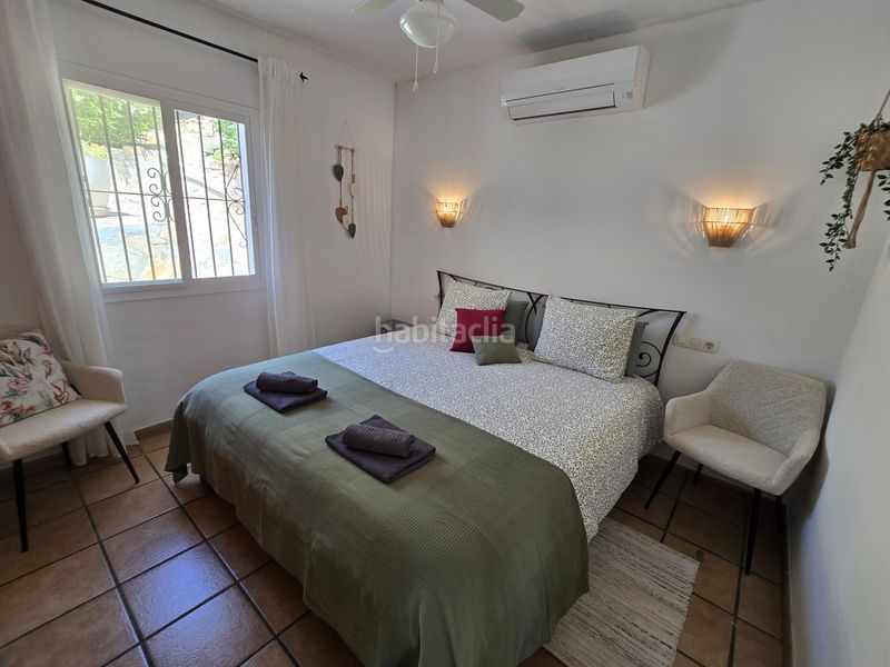 Foto b562f3ec-72a8-477b-b21e-f85aed17883a. Casa amb piscina a Viñuela
