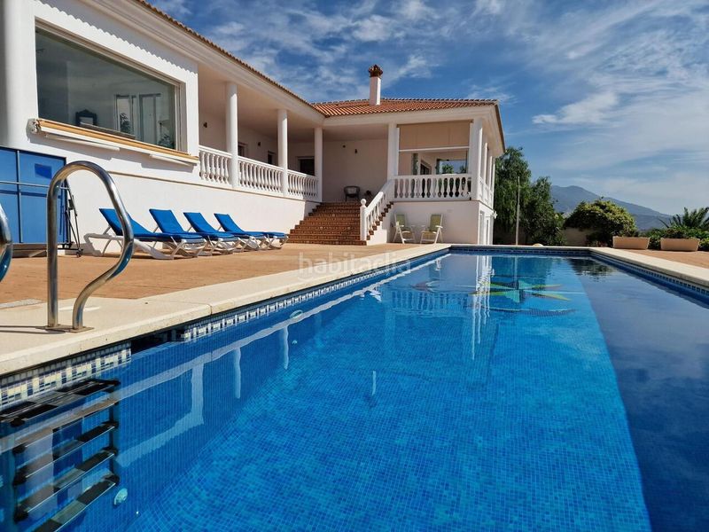 Foto f1e18c77-8e3b-4ed8-9922-f9a07a6ba6a0. Casa en Periana